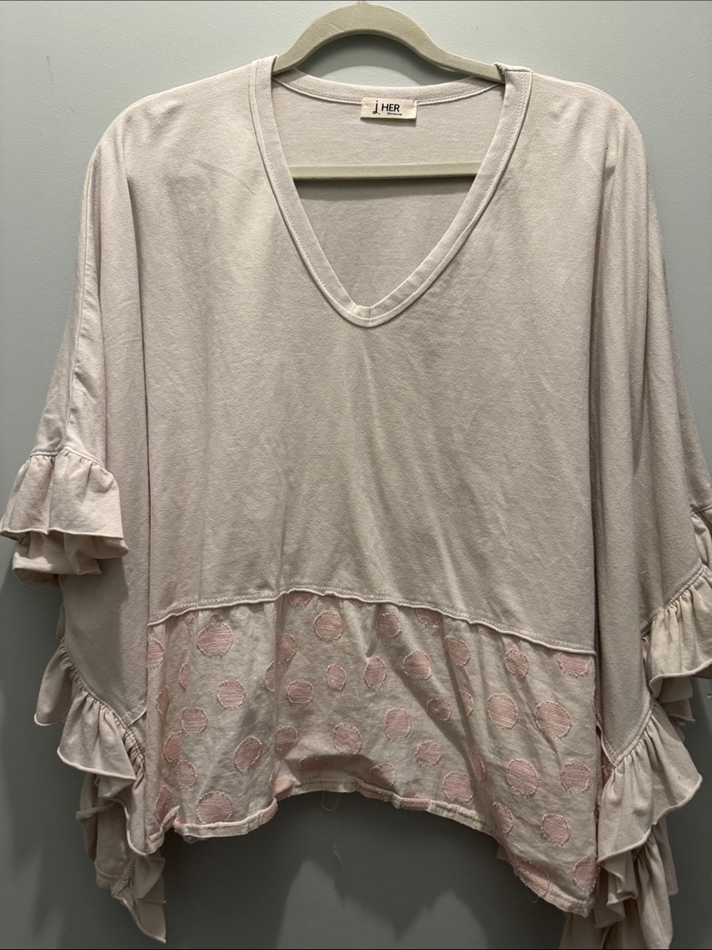 J HER cream V-Neck Ruffle poncho style top with light pink Polka Dot Hem Accent